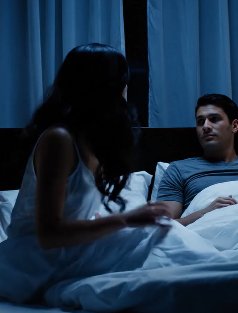 My husband’s best friend kept “sleepwalking” into our bed—and cuddling him.